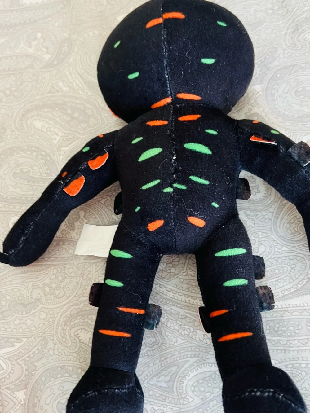 Star Wars plushie & Black Plush Toy with Neon Green & Orange Accents